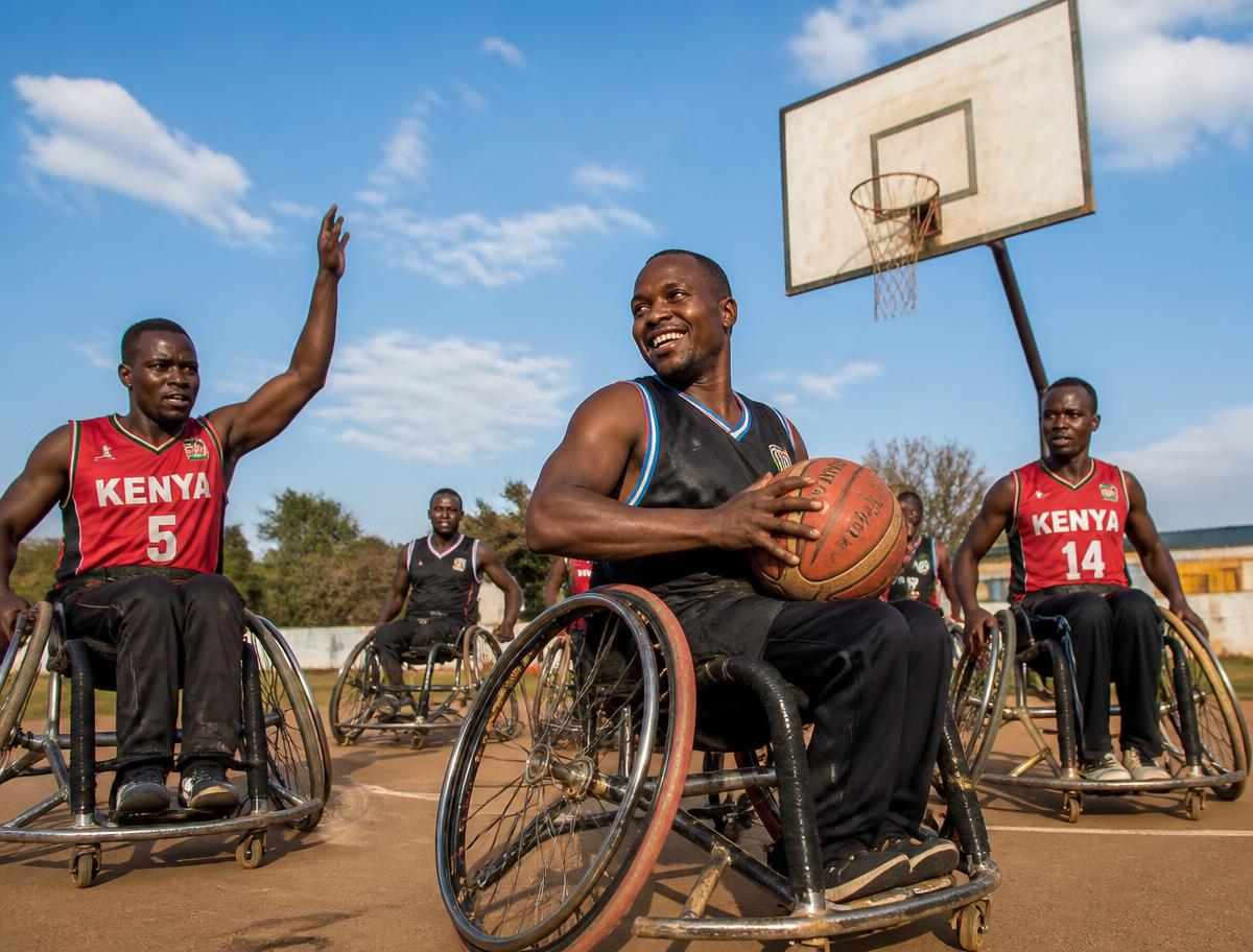 Kenyan wheelchair basketball players training on an outdoor court